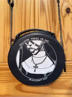 Blackcraft Cult Round Crossbody Bag with Graphic Nun Print
